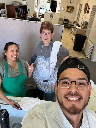 Felipe Avina from declare it restored & remodeled volunteering at a soup kitchen