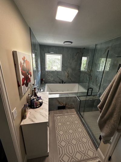Fully remodeled bathroom following water damage restoration