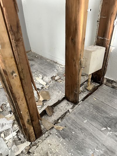 Structural wall with signs of water damage and mold