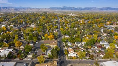 Wide aerial photo of Arvada, CO neighborhoods