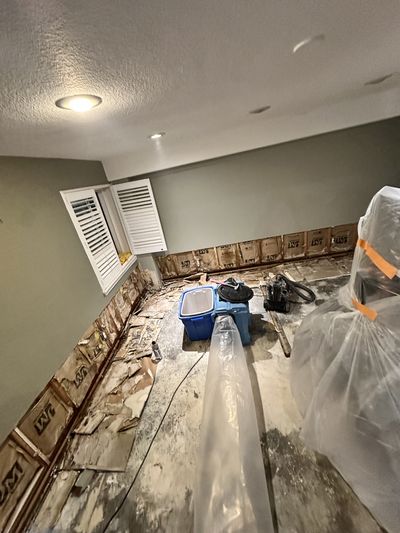 Water damage restoration equipment set up in a previously flooded basement
